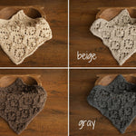 Soft hand-knitted newborn layer with tiny pom-poms — delicate wool prop ideal for baskets, wraps, or layered newborn photography setups.