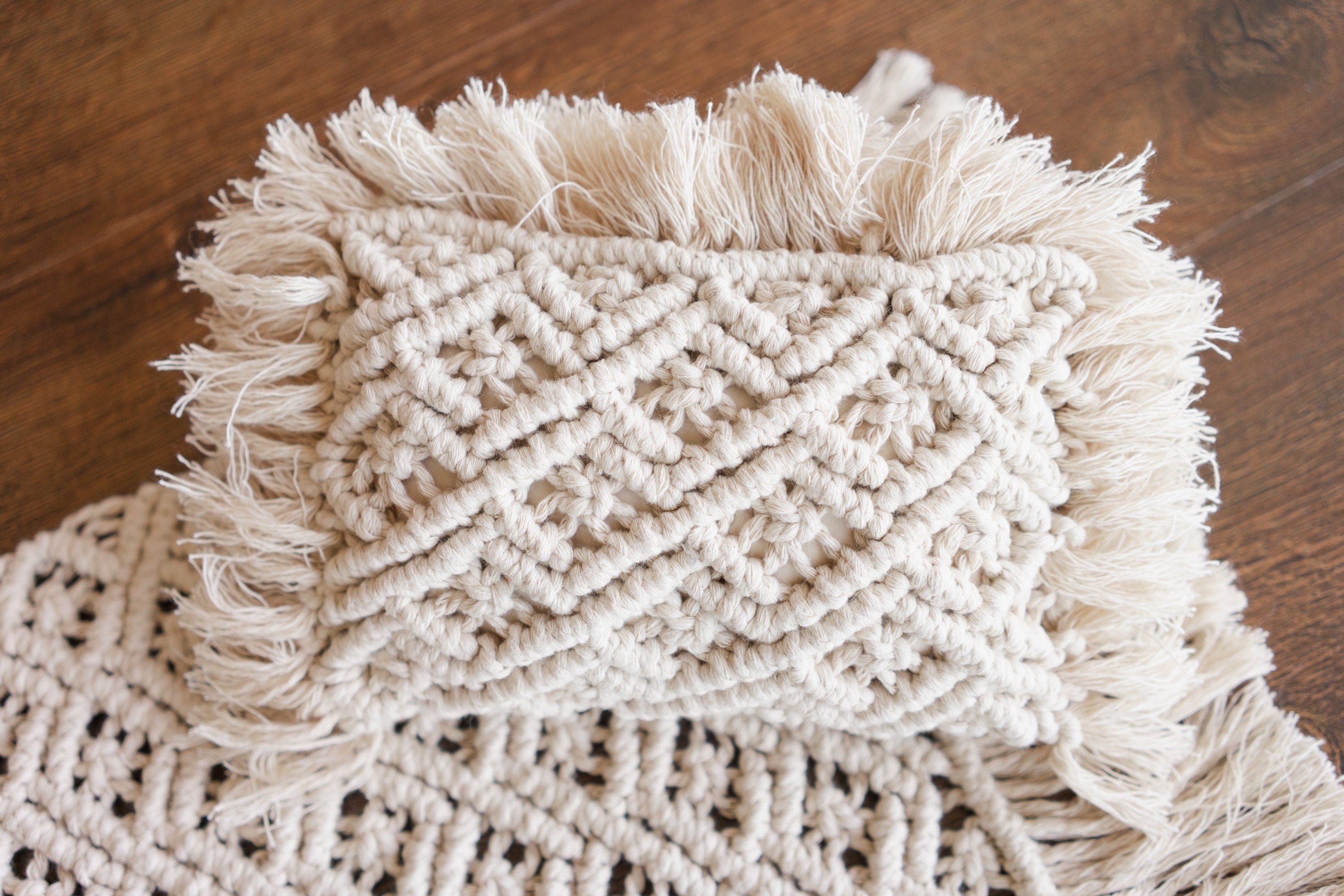 Boho macrame newborn props — matching pillow and placemat add natural texture, warmth, and timeless charm to newborn photo shoots.