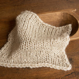Soft knitted baby blanket and pom-pom hat – newborn photo session accessory