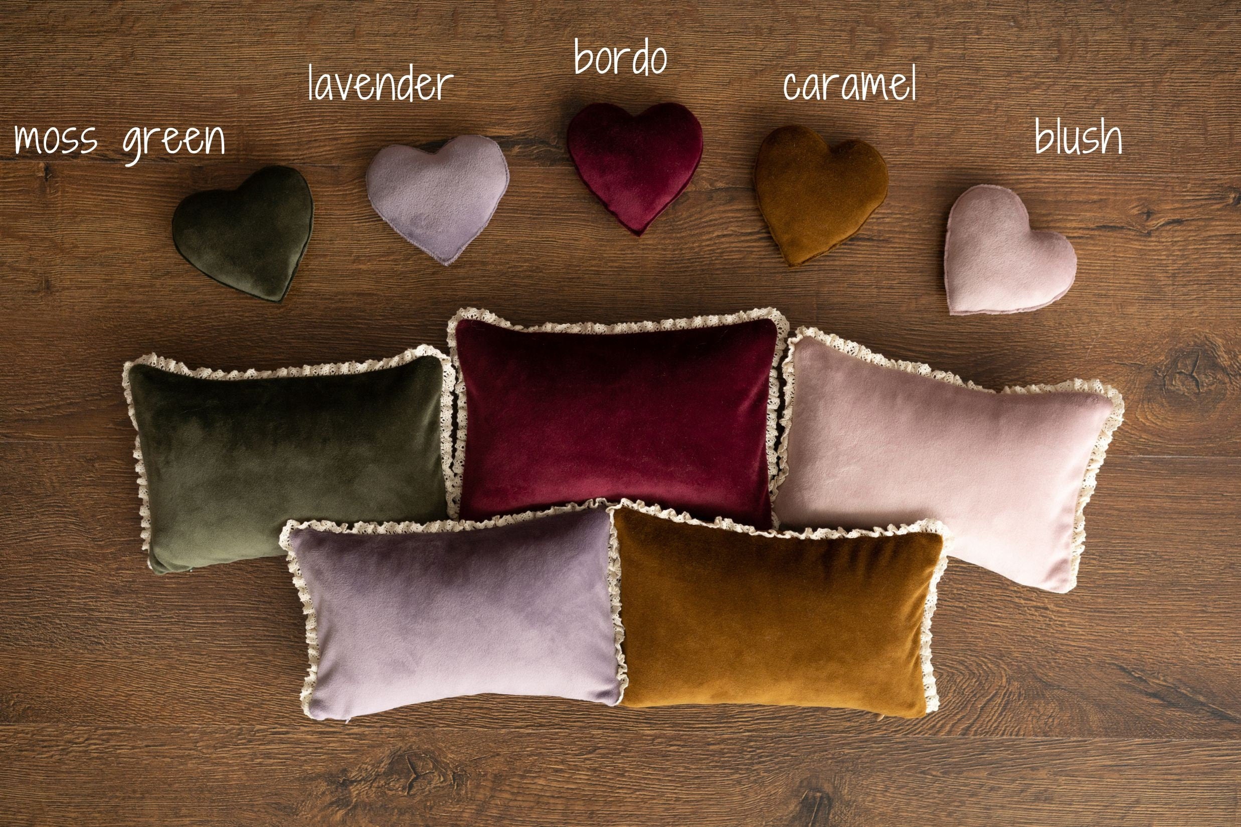 Soft velvet newborn photo pillow, used as a posing prop for newborn photography sessions