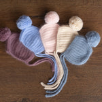 Handmade baby knitted bonnet with pompom – soft angora wool for newborns