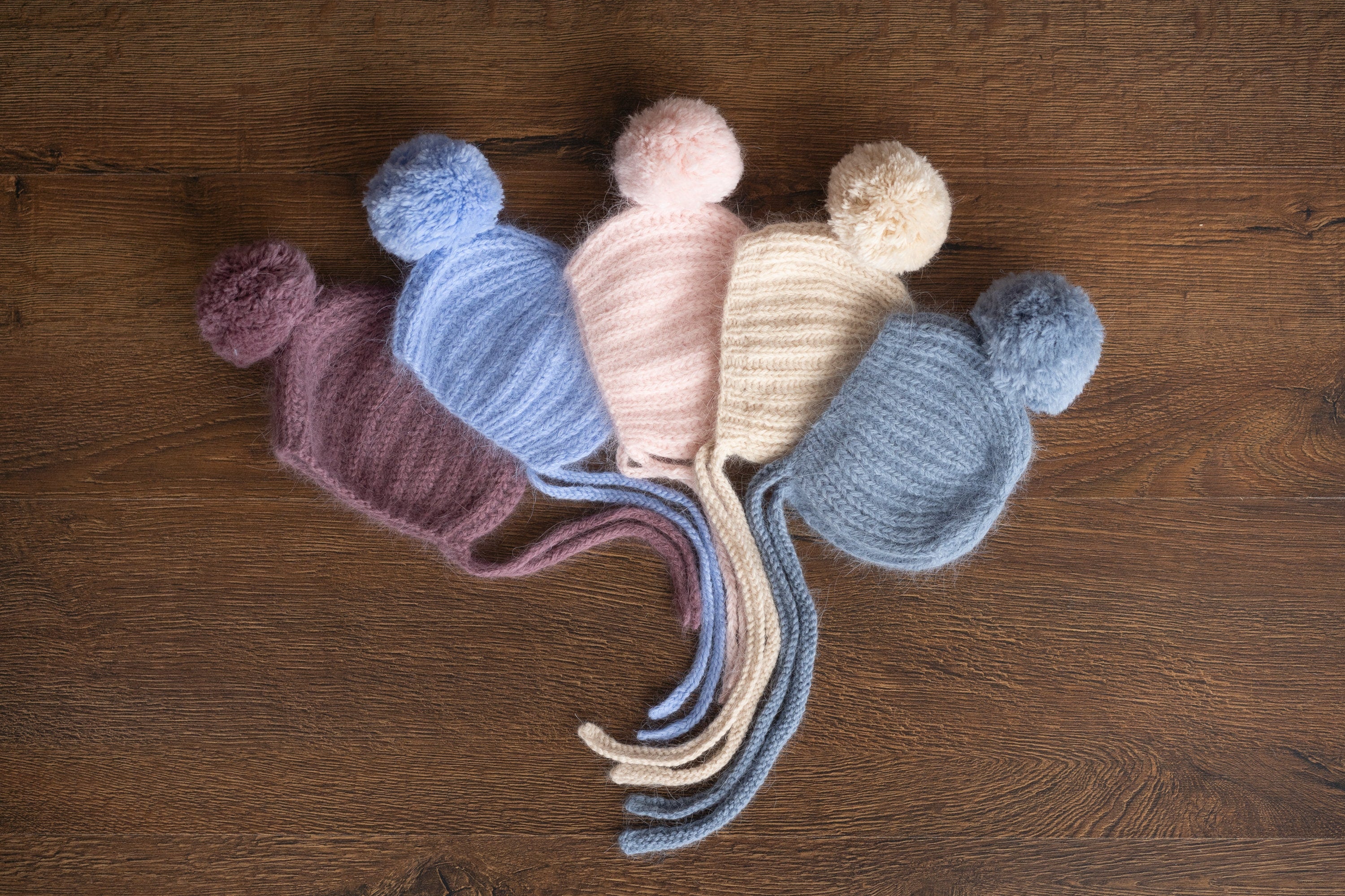 Handmade baby knitted bonnet with pompom – soft angora wool for newborns
