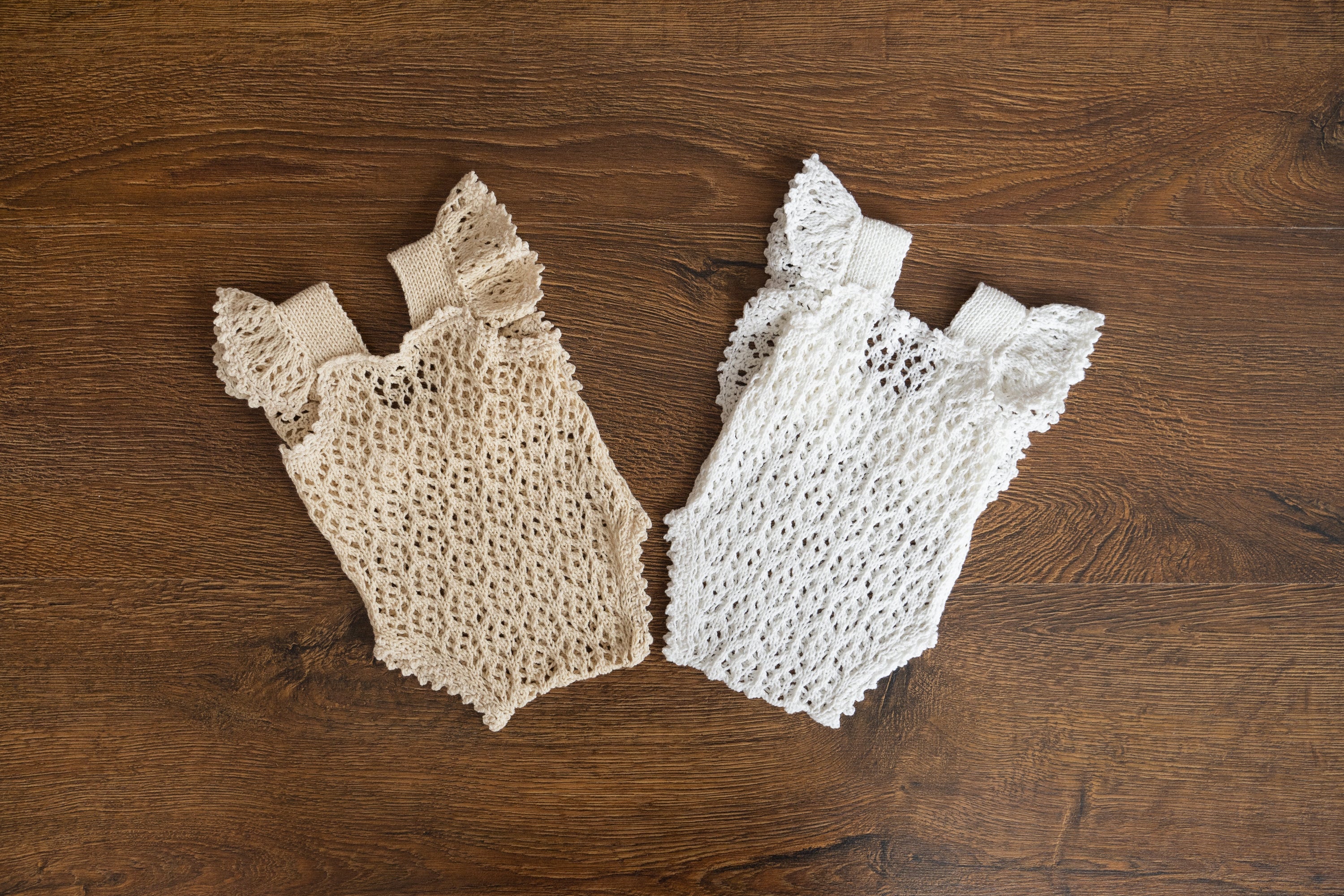 Hand-knitted newborn romper and bonnet set — soft, breathable cotton with delicate ruffle sleeves, perfect for newborn photoshoots, first birthdays, baptisms, or summer outings.
