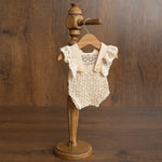 Hand-knitted newborn romper and bonnet set — soft, breathable cotton with delicate ruffle sleeves, perfect for newborn photoshoots, first birthdays, baptisms, or summer outings.