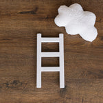 Handcrafted wooden ladder for newborn photo sessions
