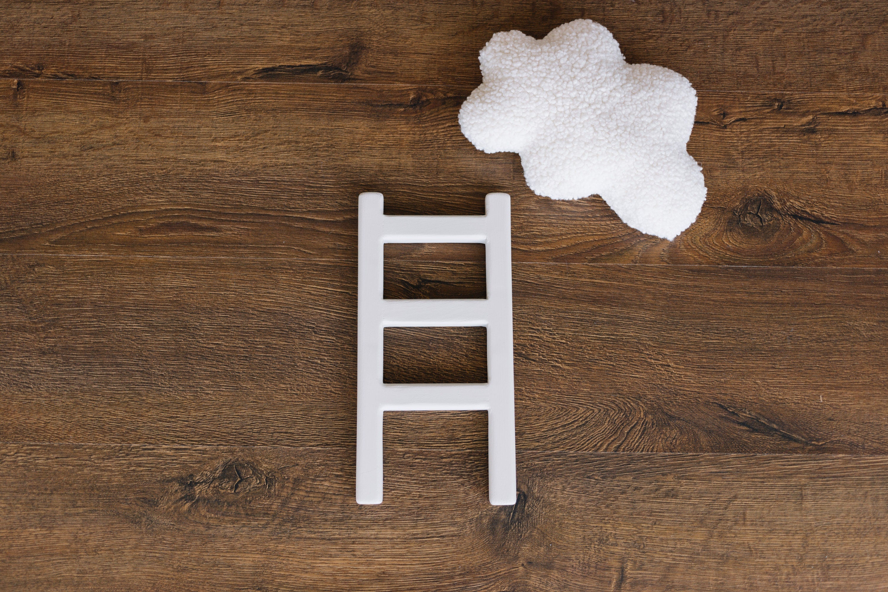 Handcrafted wooden ladder for newborn photo sessions
