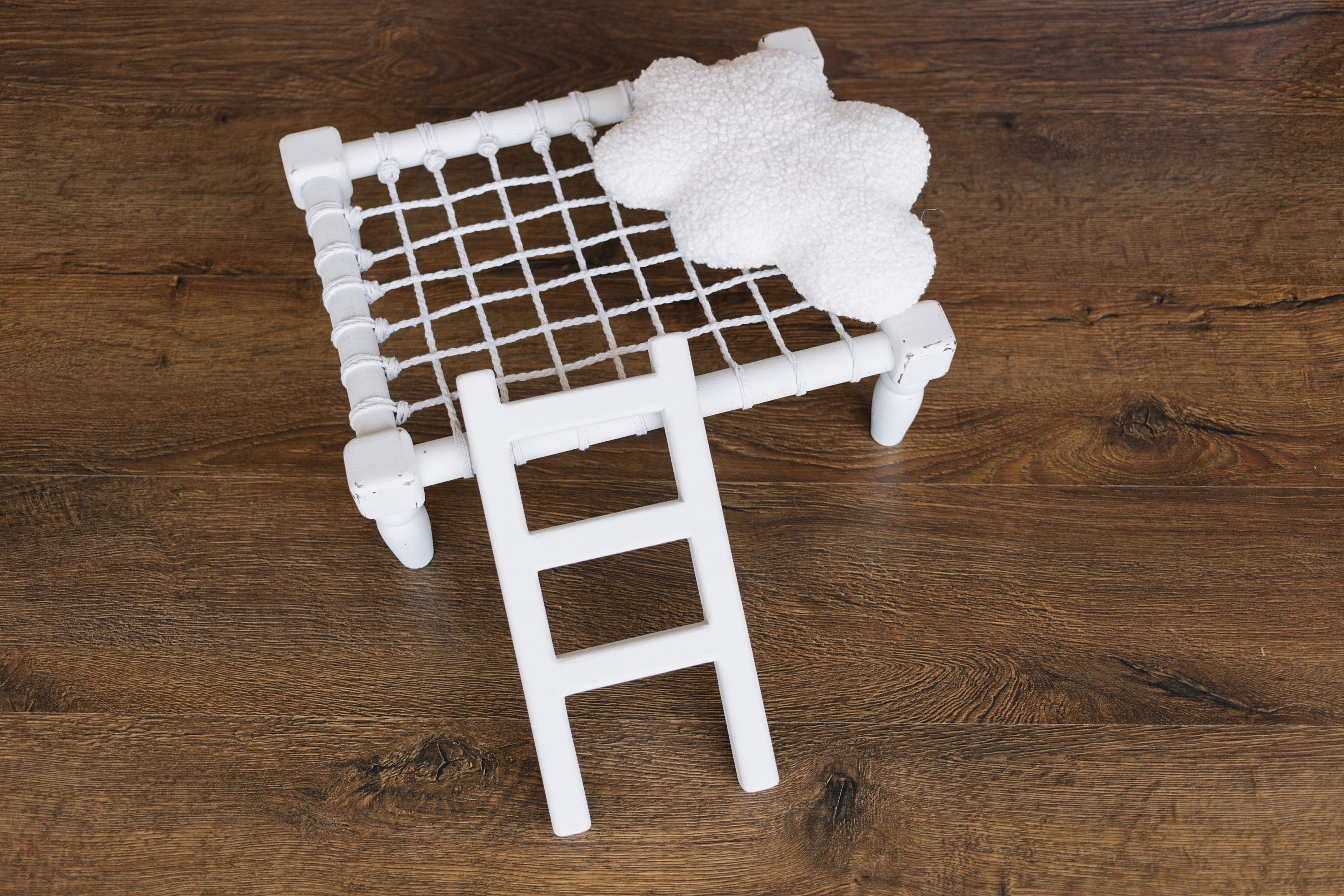 Handcrafted wooden ladder for newborn photo sessions
