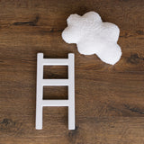 Handcrafted wooden ladder for newborn photo sessions