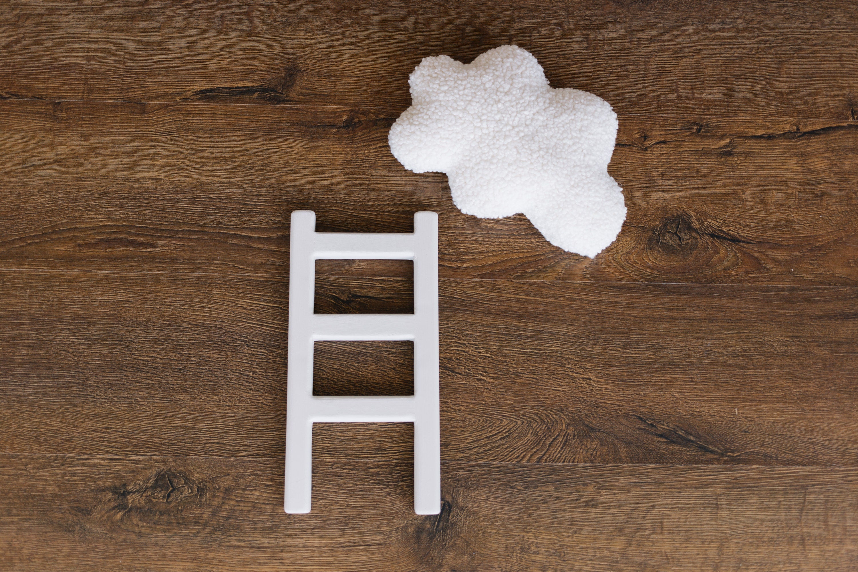 Handcrafted wooden ladder for newborn photo sessions