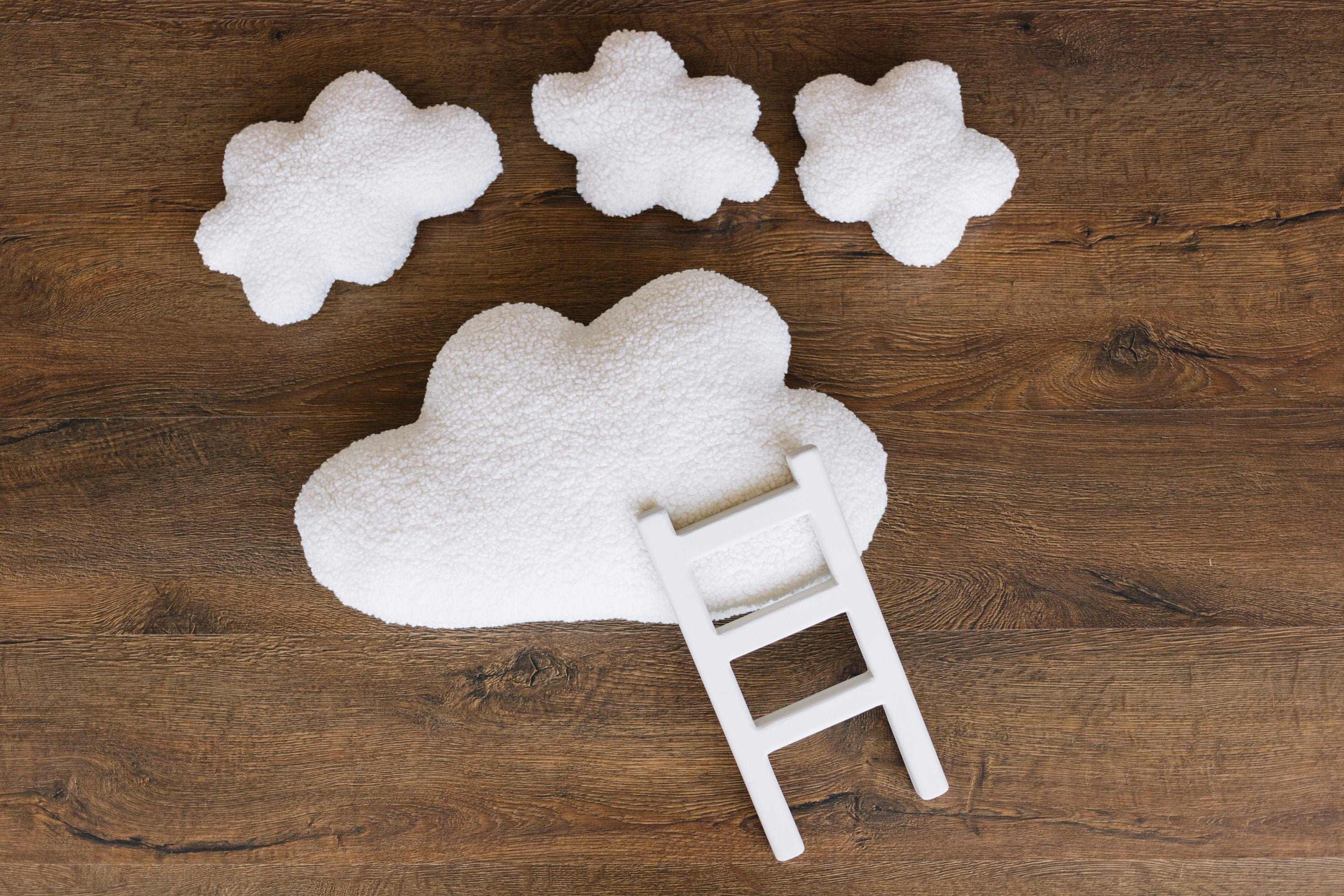 Handcrafted wooden ladder for newborn photo sessions