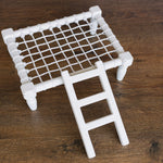 Handcrafted wooden ladder for newborn photo sessions