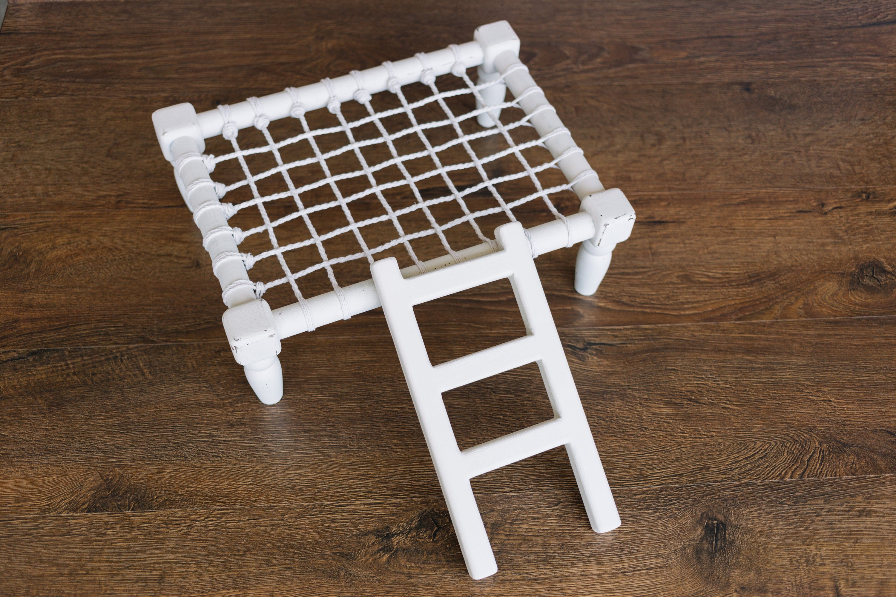 Handcrafted wooden ladder for newborn photo sessions