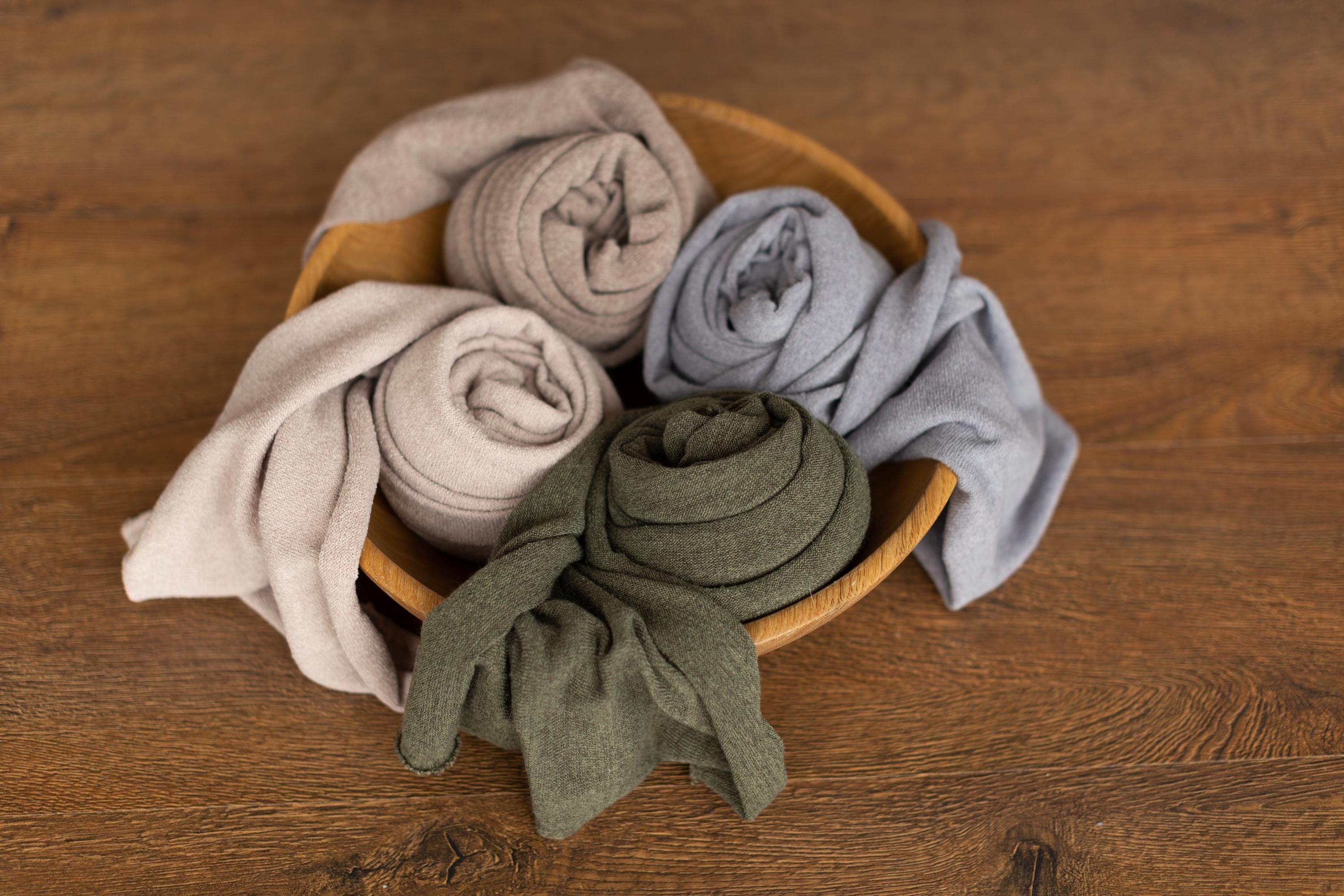 Extra-long melange newborn wrap in soft fabric, styled as a newborn photography prop for posing and photo sessions
