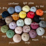 Handmade baby knitted bonnet with pompom – soft angora wool for newborns