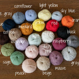 Handmade baby knitted bonnet with pompom – soft angora wool for newborns