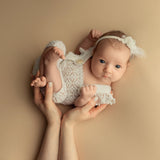 Hand-knitted newborn romper and bonnet set — soft, breathable cotton with delicate ruffle sleeves, perfect for newborn photoshoots, first birthdays, baptisms, or summer outings.