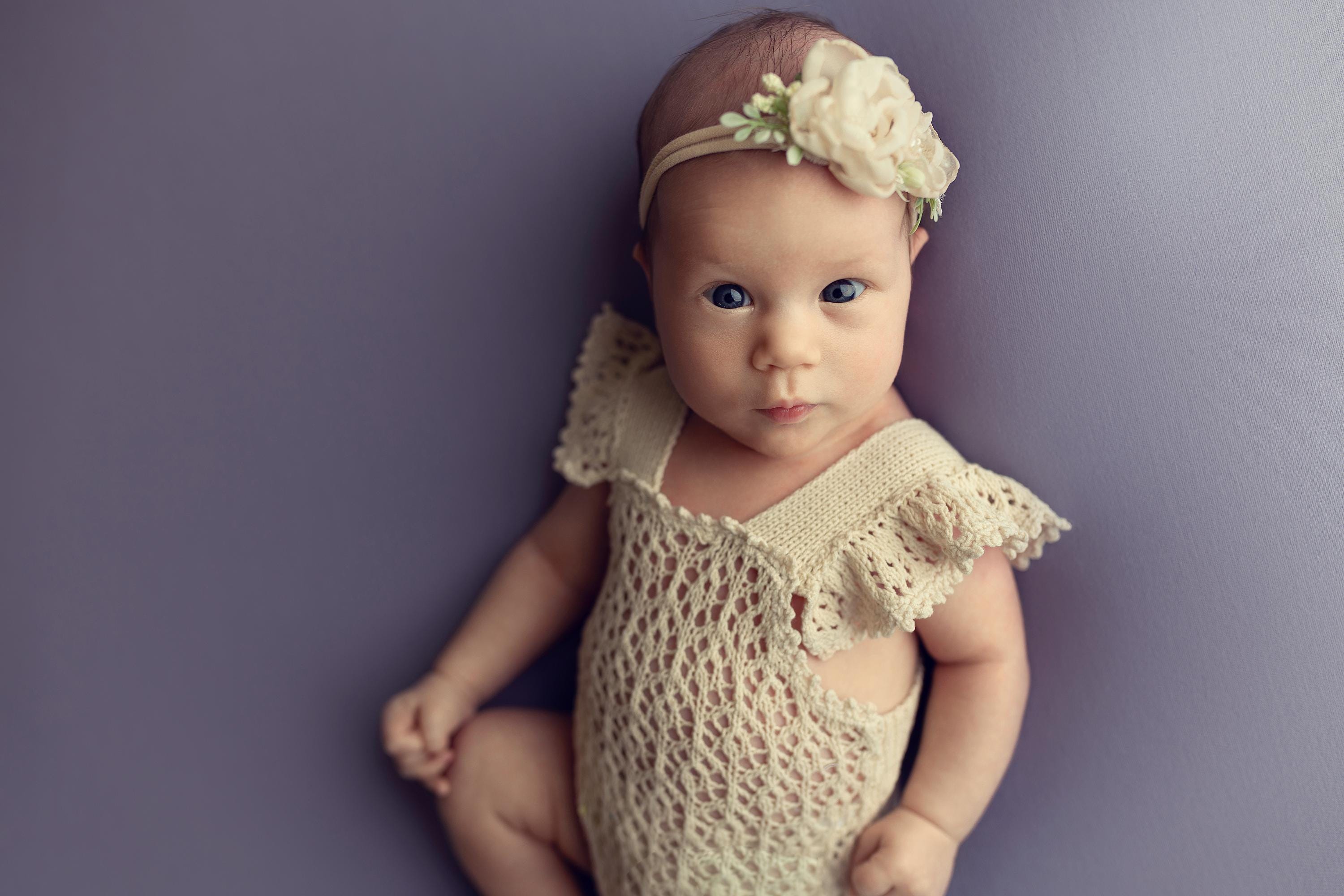 Hand-knitted newborn romper and bonnet set — soft, breathable cotton with delicate ruffle sleeves, perfect for newborn photoshoots, first birthdays, baptisms, or summer outings.