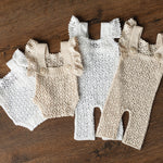 Hand-knitted newborn romper and bonnet set — soft, breathable cotton with delicate ruffle sleeves, perfect for newborn photoshoots, first birthdays, baptisms, or summer outings.