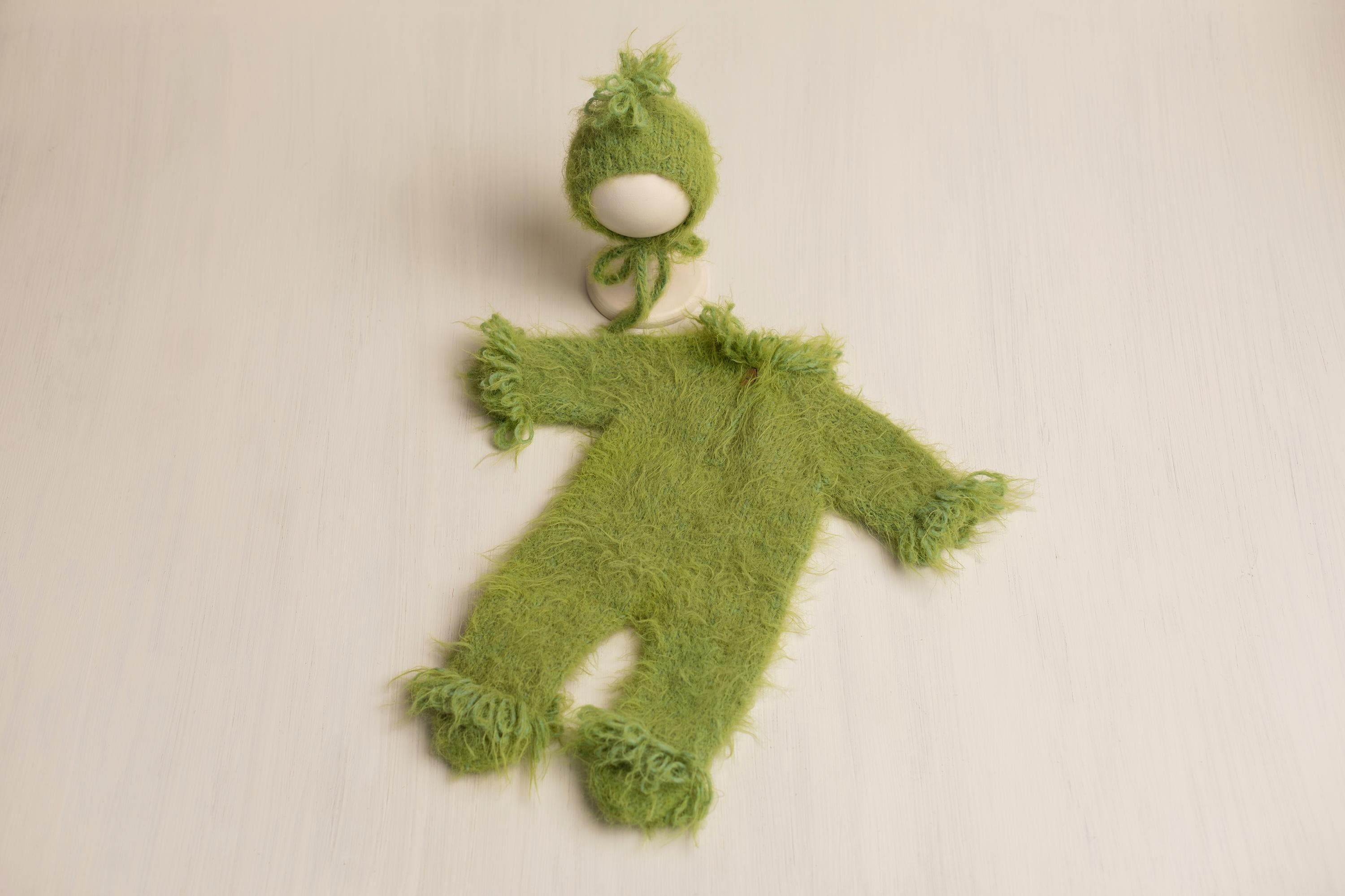 Whimsical Holiday Green Monster Outfit for Newborns with Felted Toy and Striped Scarf