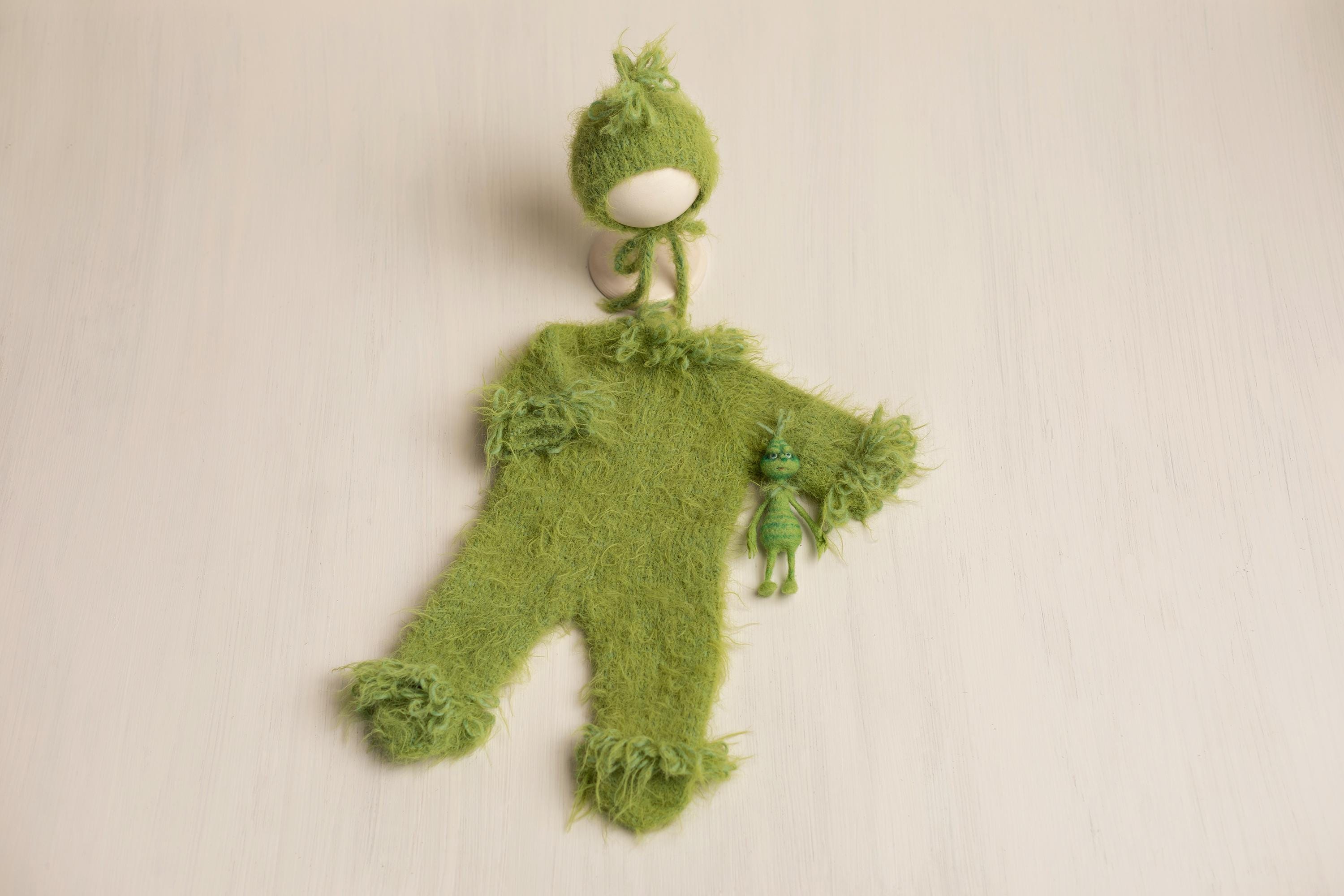 Whimsical Holiday Green Monster Outfit for Newborns with Felted Toy and Striped Scarf